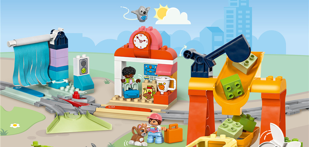 Stavebnica LEGO® DUPLO® 10428 Veľký interaktívny komunitný vláčik Push & Go vláčik reaguje na akčné kocky svetelnými a zvukovými efektmi a ponúka aj rôzne stanovištia.