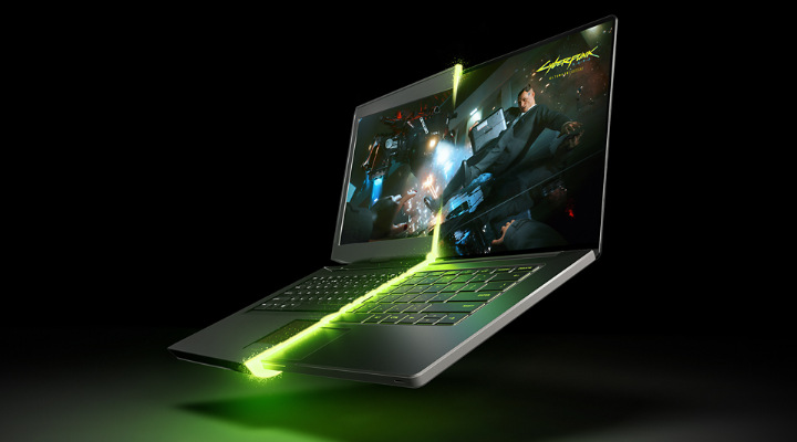 Zariadenie zobrazujúce živú hru z videohry, ktorú diagonálne rozdeľuje zelené laserové svetlo.