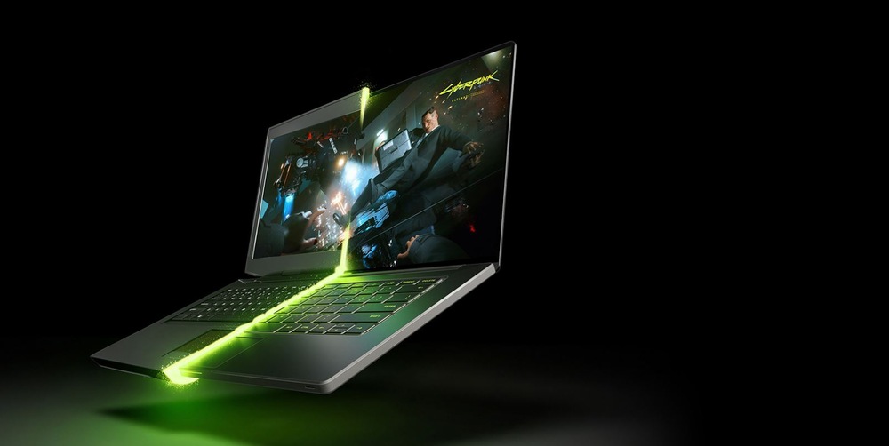 Notebook GIGABYTE GAMING A16 PRO DYHG5CZCC4SH čierny Elegantný notebook so žiarivými zelenými akcentmi zobrazuje na displeji scénu z hry Cyberpunk 2077, ktorá navodzuje futuristickú atmosféru.