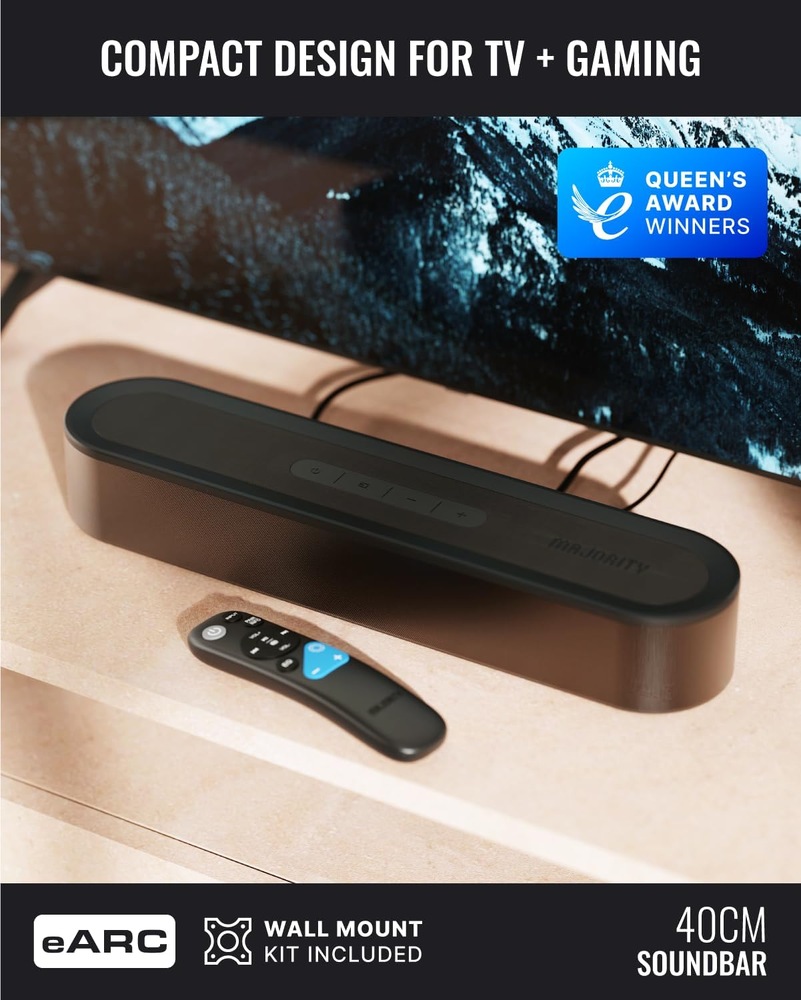 Soundbar Majority Bowfell Axis 2.1 čierny Kompaktný soundbar Majority Bowfell Axis 2.1 umiestnený pod televízorom s diaľkovým ovládačom