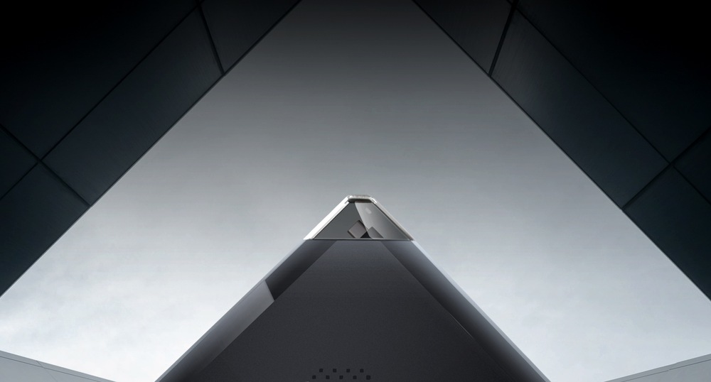 Externá DVD napaľovačka Asus ZenDrive V1M ultraslim USB-C čierna Elegantná čierna trojuholníková konštrukcia smerujúca k nebu v modernom, futuristickom dizajne s ostrými uhlami.
