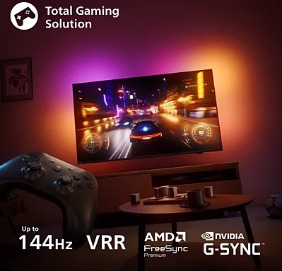 Televízor Philips 65OLED951 Televízia Philips OLED951 pri hraní závodnej hry, v popredí herný ovládač a informácie o herných technológiách