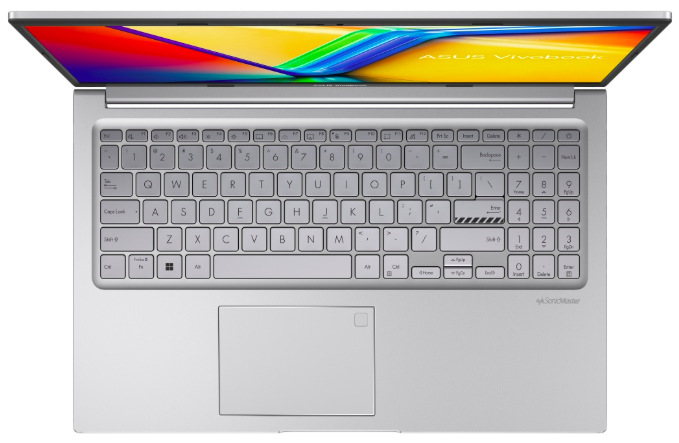Pohľad zhora na klávesnicu s numerickým blokom a touchpad notebooku ASUS Vivobook 15″ width=