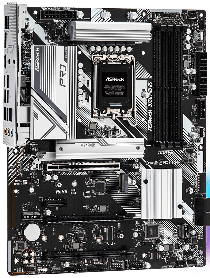 Z horného pohľadu je v ľavej hornej časti zadný I/O panel s portami pre externé zariadenia. Hore uprostred je pätica Intel 1700 a vpravo od nej štyri DDR5 sloty. Na pravom okraji je 24pin napájanie a hore napájanie pre CPU. Uprostred sú PCIe sloty pre grafiku a rozšírenie, blízko sú tri M.2 pozície a na pravej/spodnej časti štyri SATA porty. Dole sú konektory pre predný panel skrine, interné USB, audio, RGB a ventilátory.