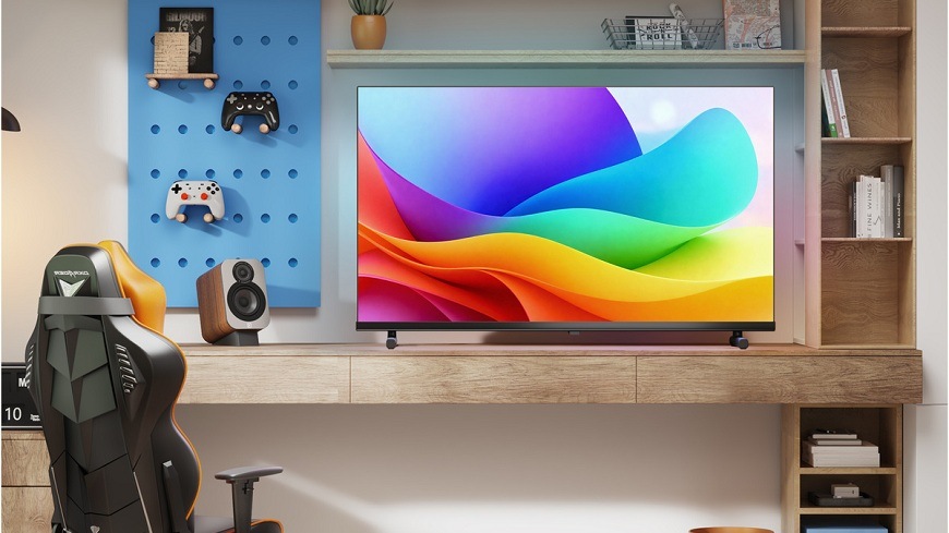 Televízor Hisense 40A5S televízia Hisense 40A5S s farbami na displeji stojí na stole v hernej miestnosti