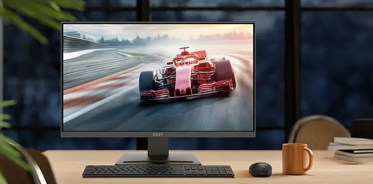 Monitor MSI PRO MP241 E14V čierny Monitor MSI PRO MP241 E14V pri hraní závodnej hry na pracovnom stole s klávesnicou a myšou