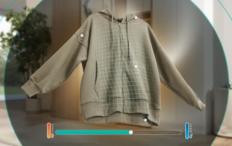 Sušička bielizne Gorenje G400 DG48D NatureDry čierna mikina, na ktorej sú vidieť body ako senzory sušenia, vďaka ktorým sušička vie, kedy má prestať sušiť. V spodnej časti je stupnica zostávajúceho vlhka v bielizni.